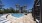 Pool with Cabanas and Loungers 